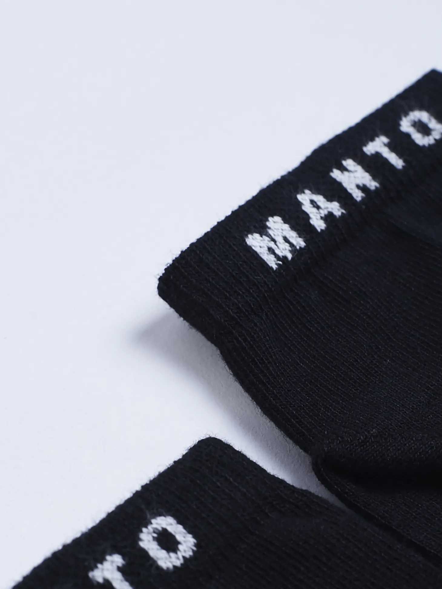 MANTO Socken LOGO schwarz